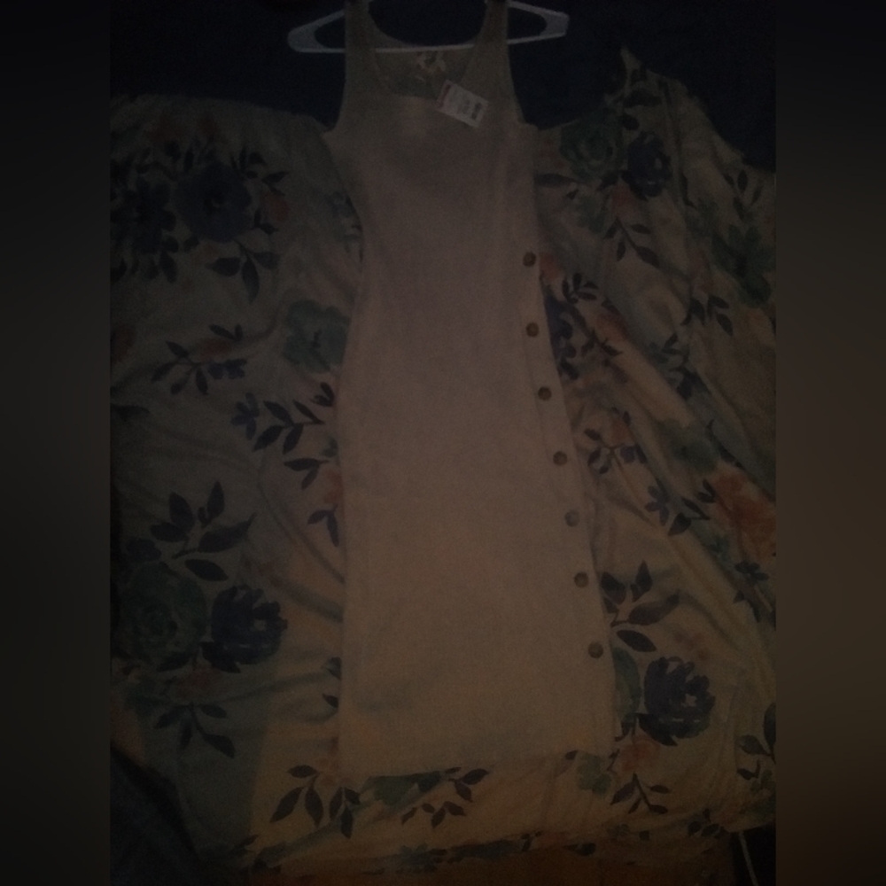 Dress with buttons on the side